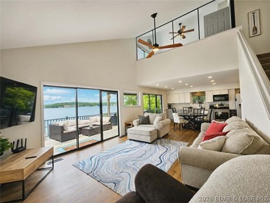 Step inside to vaulted ceilings and a stunning primary suite - photo 1