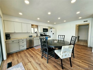 Step inside to vaulted ceilings and a stunning primary suite - photo 6