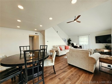 Step inside to vaulted ceilings and a stunning primary suite - photo 8