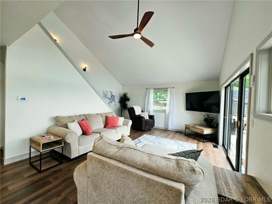 Step inside to vaulted ceilings and a stunning primary suite - photo 10