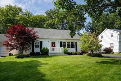 Conveniently located near Lake Ontario, this spacious 3-bedroom - photo 1