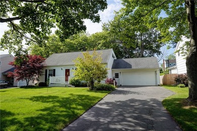 Conveniently located near Lake Ontario, this spacious 3-bedroom - photo 2