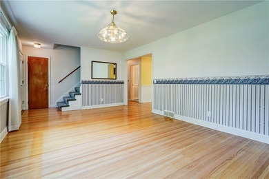 Conveniently located near Lake Ontario, this spacious 3-bedroom - photo 4