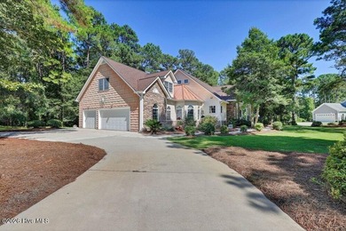 Luxury Home in Pelican Reef | 107 South Grist Mill Road | - photo 2