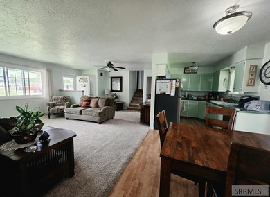 Nestled on a beautifully landscaped 0.45-acre lot in Shelley - photo 3