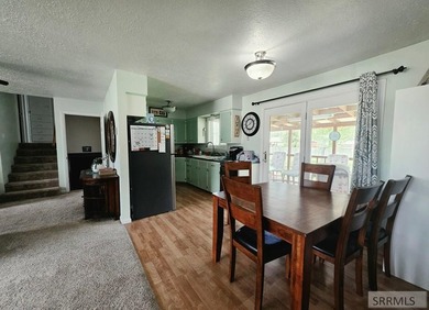 Nestled on a beautifully landscaped 0.45-acre lot in Shelley - photo 4