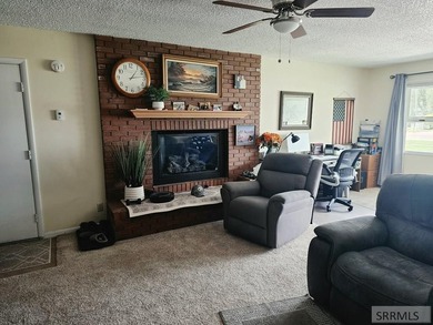 Nestled on a beautifully landscaped 0.45-acre lot in Shelley - photo 10