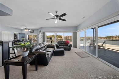 Welcome to effortless lakefront living at this beautifully - photo 1