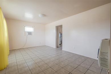 Cute, Cozy, and Convenient! This two-bedroom, one-bath charmer