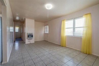 Cute, Cozy, and Convenient! This two-bedroom, one-bath charmer