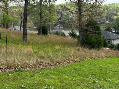Nestled within the quiet privacy of a gated community, is a - photo 3
