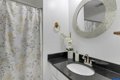 Ready to enjoy this perfectly manicured front yard & beautiful