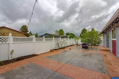 Ready to enjoy this perfectly manicured front yard & beautiful