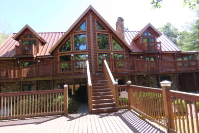 This custom built 5700 sq ft log home has 480 feet of waterfront. - Lake Home For Sale in Lewisburg, Kentucky