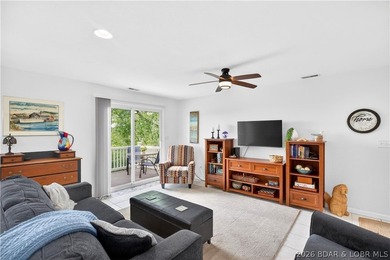 Experience lake living at its finest in this beautifully updated - photo 3
