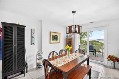 Experience lake living at its finest in this beautifully updated - photo 4