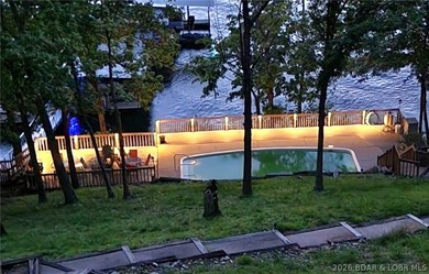 Experience lake living at its finest in this beautifully updated - photo 5