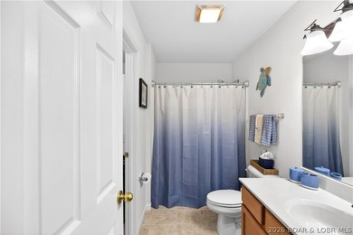 Experience lake living at its finest in this beautifully updated - photo 7