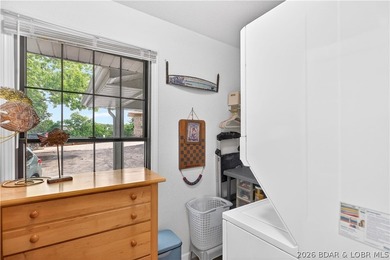 Experience lake living at its finest in this beautifully updated - photo 8