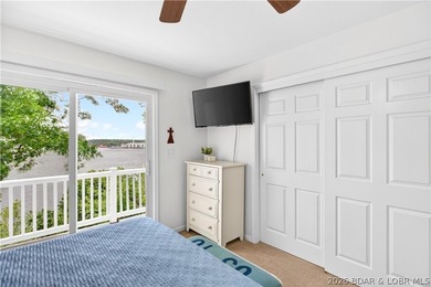 Experience lake living at its finest in this beautifully updated - photo 10