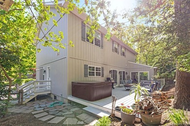 Tucked away on a beautifully landscaped property, this 2022 - photo 22