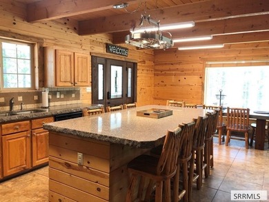 Beautiful cabin located near the Island Park Golf Course! With - photo 7