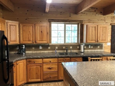 Beautiful cabin located near the Island Park Golf Course! With - photo 8