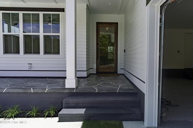 Experience coastal luxury in this stunning new construction home - photo 4