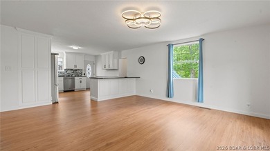 Enjoy lakefront living at its best in this beautifully remodeled - photo 4
