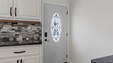 Enjoy lakefront living at its best in this beautifully remodeled - photo 6