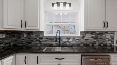 Enjoy lakefront living at its best in this beautifully remodeled - photo 8