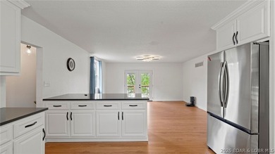 Enjoy lakefront living at its best in this beautifully remodeled - photo 9
