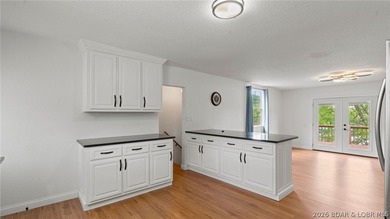 Enjoy lakefront living at its best in this beautifully remodeled - photo 10