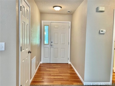 This lovely home is located in a sought-after 55+ community and - photo 6