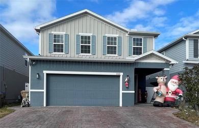 Built in 2023, this beautifully upgraded 5-bedroom, 3-bath home - photo 1