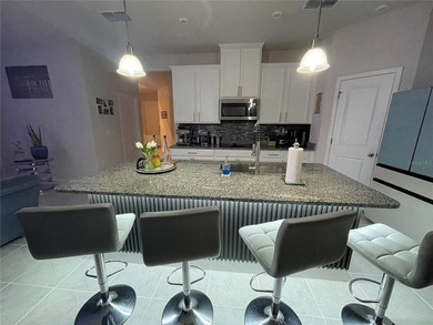 Built in 2023, this beautifully upgraded 5-bedroom, 3-bath home - photo 8
