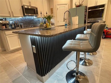 Built in 2023, this beautifully upgraded 5-bedroom, 3-bath home - photo 10