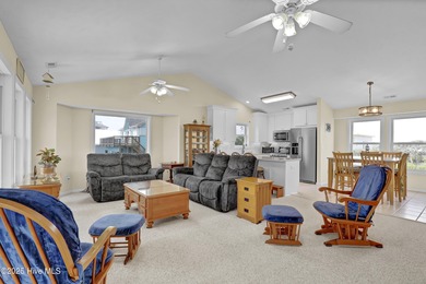 Second row home with protected ocean and sound views, an