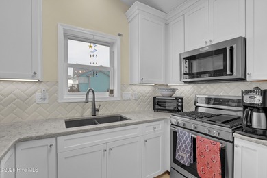 Second row home with protected ocean and sound views, an