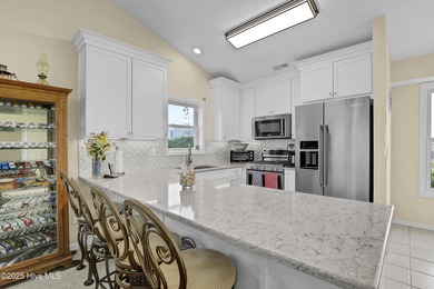 Second row home with protected ocean and sound views, an