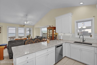 Second row home with protected ocean and sound views, an