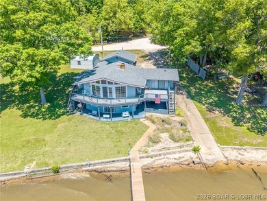 Nice, well maintained lake front home with fantastic main - photo 1