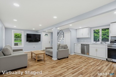 Welcome to 23 James Ave, a remodeled Colonial home exuding charm - photo 8