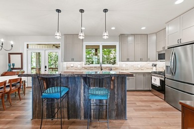 Experience luxury lake living with seasonal lake views in this - photo 20