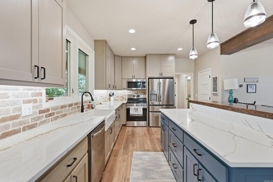 Experience luxury lake living with seasonal lake views in this - photo 23