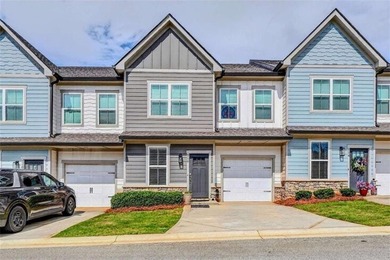 Welcome to this charming 3-bedroom, 2.5-bathroom townhome - photo 1