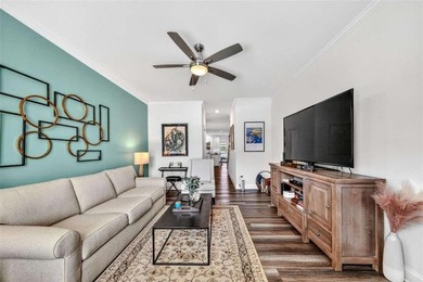 Welcome to this charming 3-bedroom, 2.5-bathroom townhome - photo 2