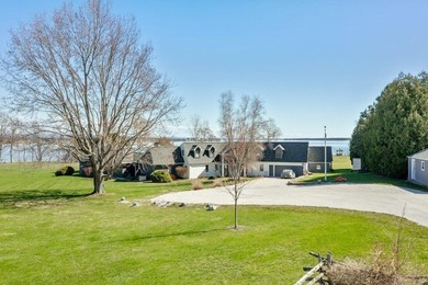 Lakefront Luxury Awaits! Nestled on over 20 sprawling acres with - photo 2