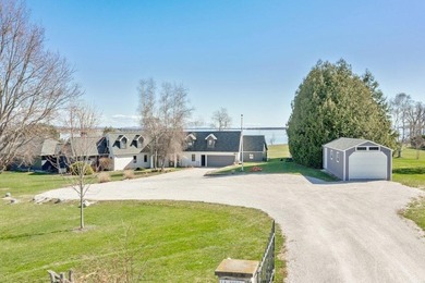 Lakefront Luxury Awaits! Nestled on over 20 sprawling acres with - photo 4