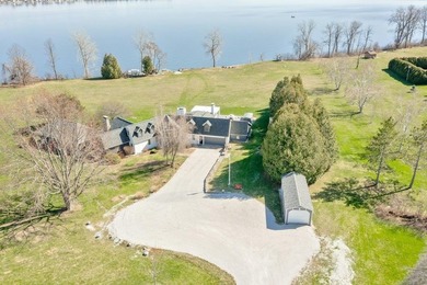 Lakefront Luxury Awaits! Nestled on over 20 sprawling acres with - photo 5